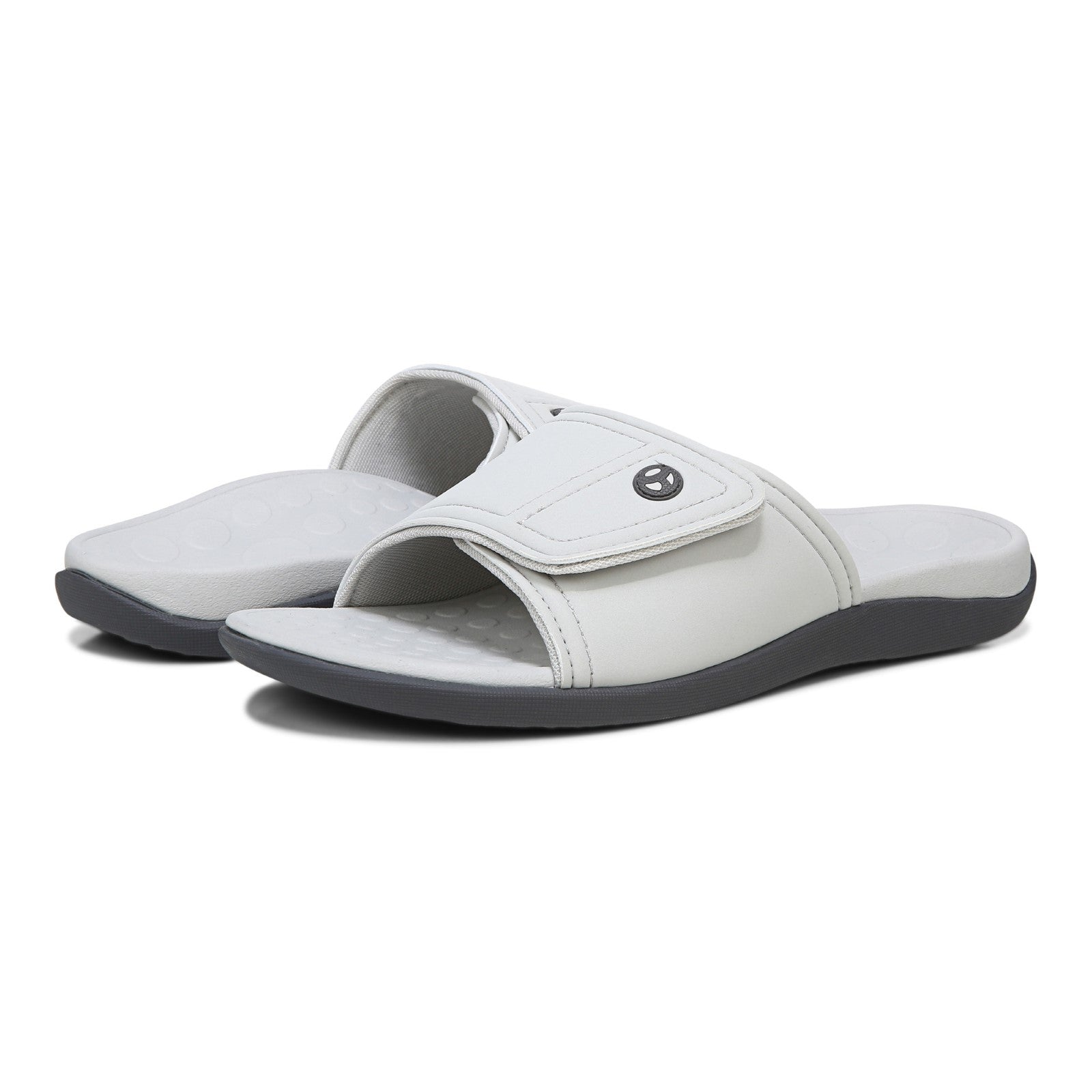 Vionic Kiwi - Unisex Motion Control Orthotic Slide Sandal - Vapor pair left angle